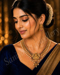 Temple Jewellery Gold-Plated Necklace Set with Earrings – Goddess Lakshmi Pendant, Pearl & Kundan Work | Bridal & Festive Wear